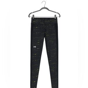 Women’s size XS black and gold Under Armour leggings. Excellent condition